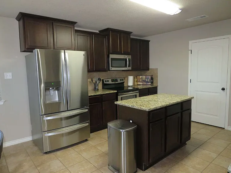 9805 Kaitlyn Dr — Photo 6