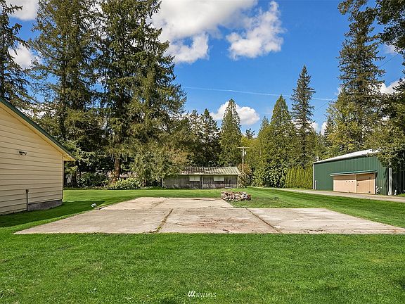 Concrete pad from previous shop could be another shop, sport court or RV parking