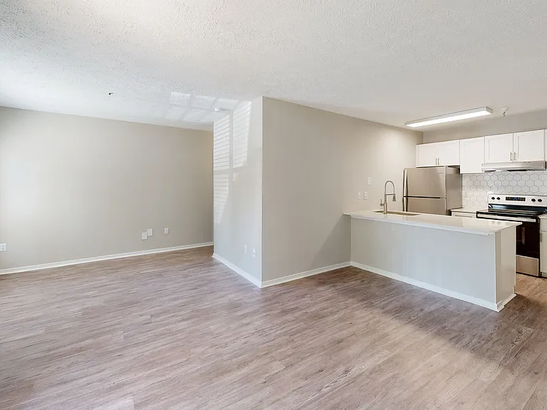 Large studio floorplan with hardwood style flooring throughout Large studio floorplan with hardwood style flooring throughout