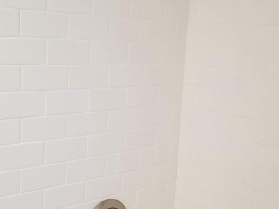Renovated bathroom with subway tile tub/shower combo!