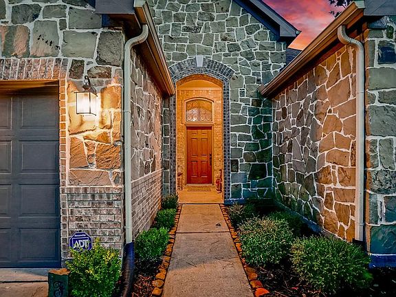 Flourishing landscape welcomes you home.