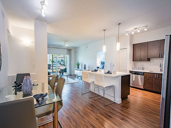 Kitchen and dining area with hard surface flooring