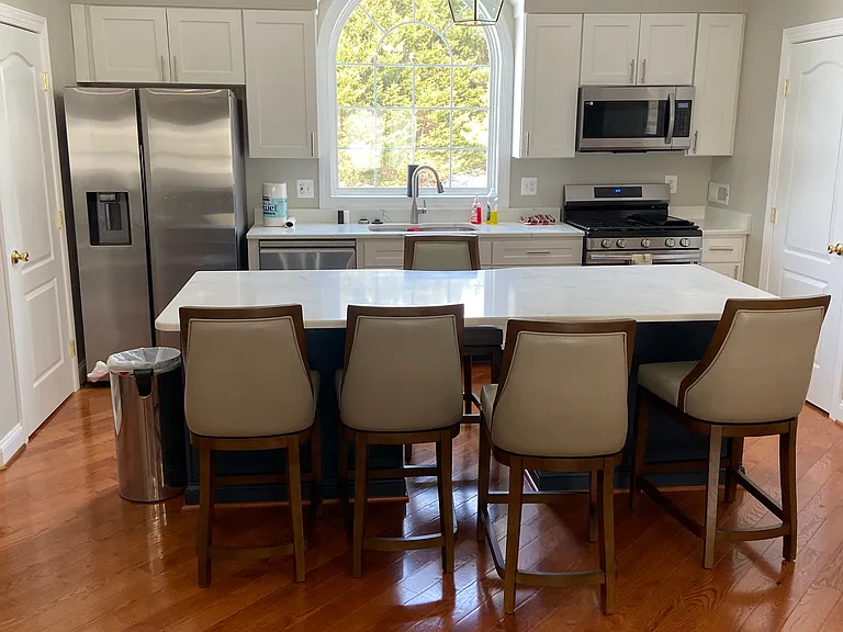 Full Kitchen with pantries to the left and right.