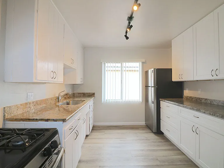 4458-64 1/2 Oregon St — Photo 1