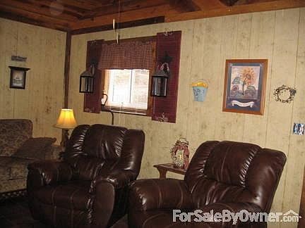 Two comfy recliners across from stove