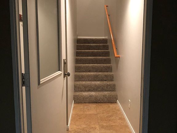 Entry way; stairs leading up to main living space