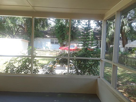 View Of Back Yard From Screen Porch.