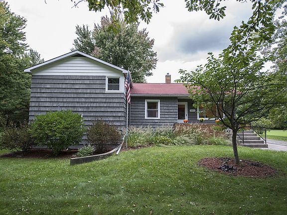 Built in 1954, the house sits on a beautiful, landscaped near full acre lot (143x264).