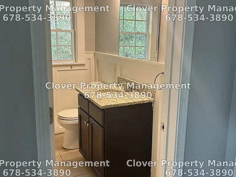 Hall Bath. Granite countertops.