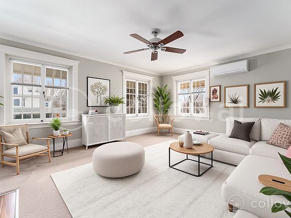 Virtually staged living room, light, bright, and overlooking a gorgeous garden