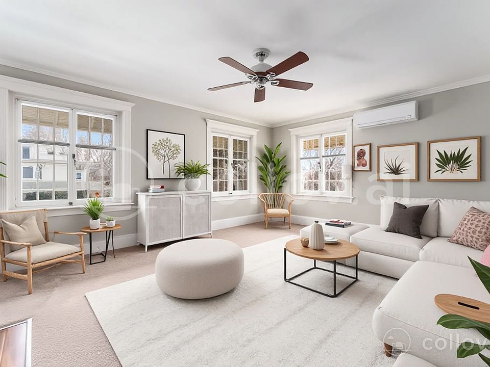 Virtually staged living room, light, bright, and overlooking a gorgeous garden