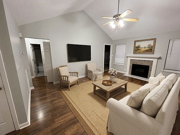 Living room (Furniture/decorations are AI generated to show future layout. Photos will be replaced with furnishing once completed.)