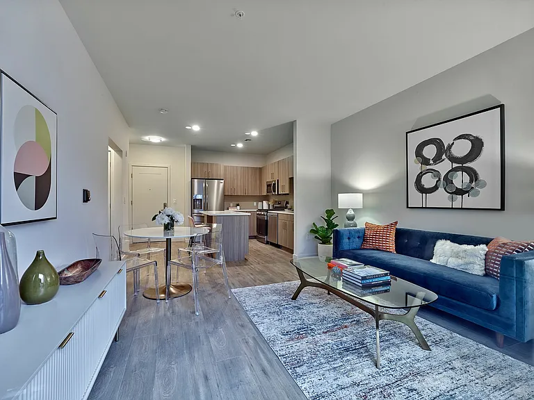 Experience the elegance of this open-concept living area, where modern design meets comfort.