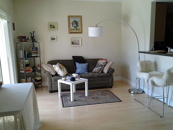 living room with breakfast bar with furniture