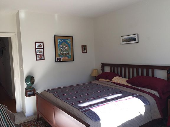 Master bedroom that opens to balcony