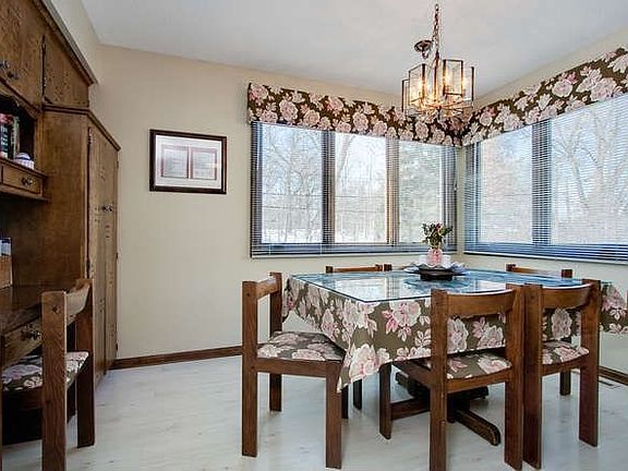 The spacious eat-in kitchen is complemented by a built-in desk.