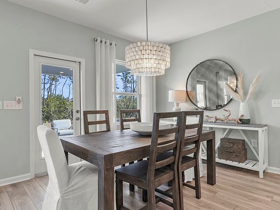 The breakfast cafe seamlessly transitions to the patio, offering an inviting space for alfresco dini