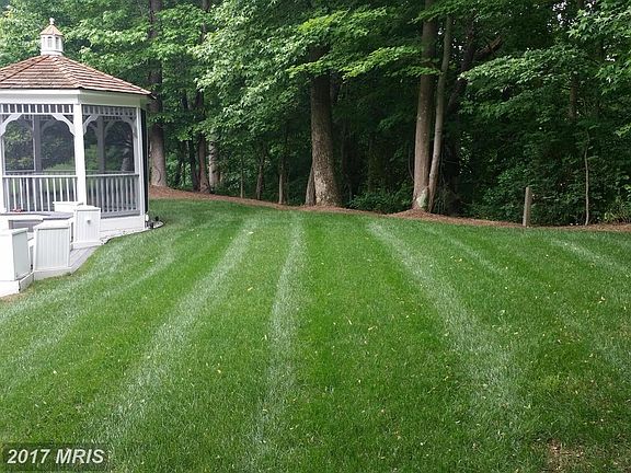 Private rear yard backing to woods