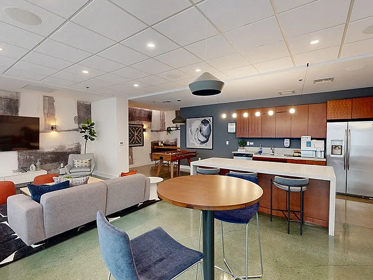 Resident lounge with kitchen, TV and games