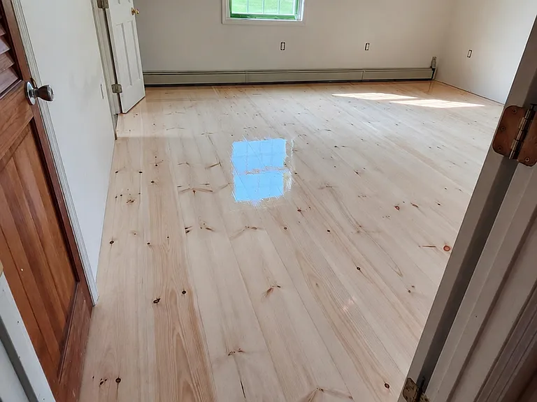Primary bedroom with closet and ensuite.