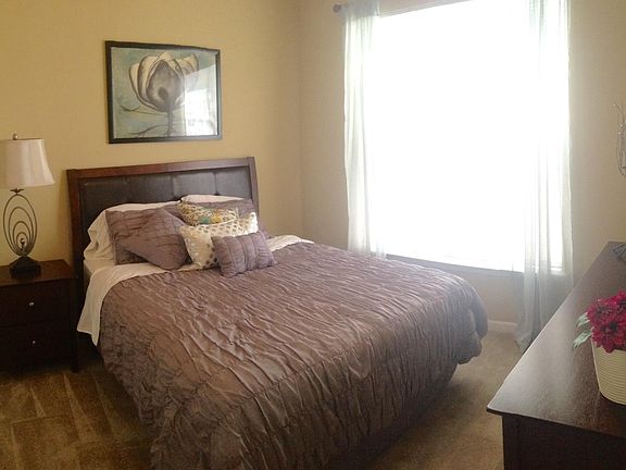 Large master bedroom with double payne windows, and a queen 