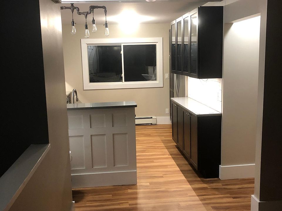 Living room looking into kitchen