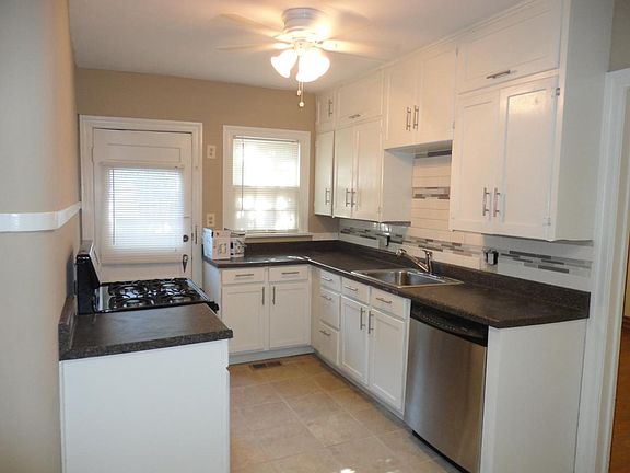 Stainless appliances, new cabinets, tile floor