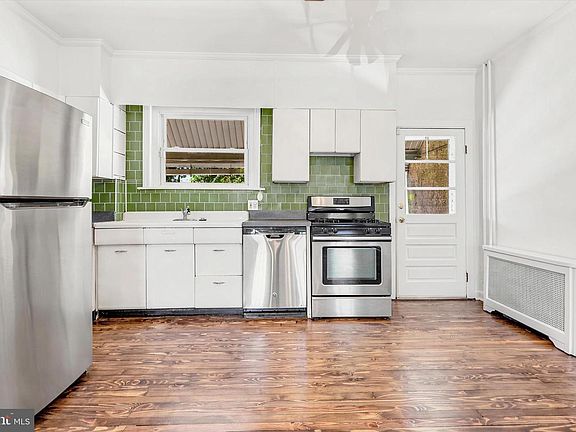 3rd image of 117 E 3rd Ave