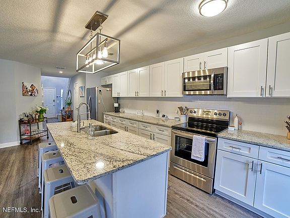 5th image of 1534 Sand Dollar Cir Unit No 13 D Lo