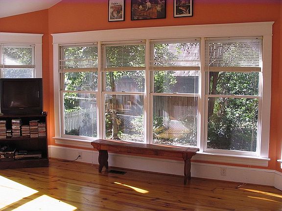 Sunroom with windows, valuted ceiling and skylights