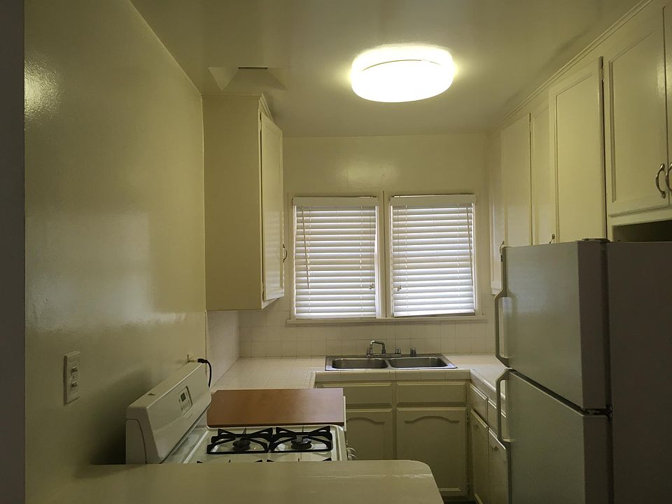 Galley Kitchen with dishwasher.