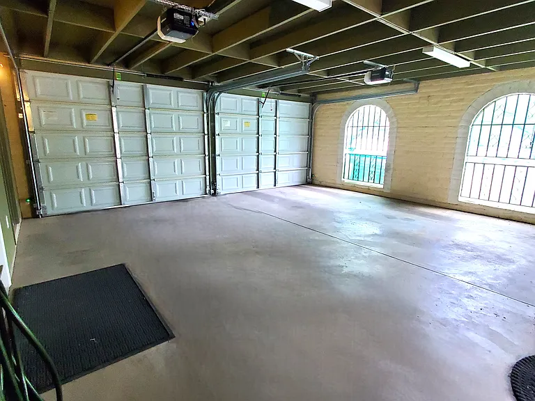 Two car garage ventilated/screens, separate doors.