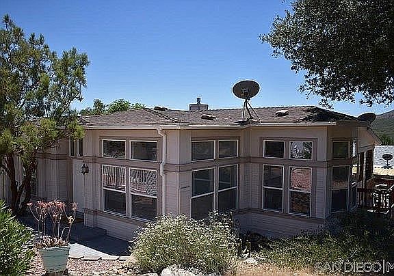 Back of home leads to patio