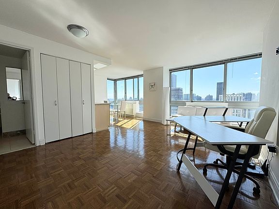 2nd image of 235 E 55th St #Penthouse