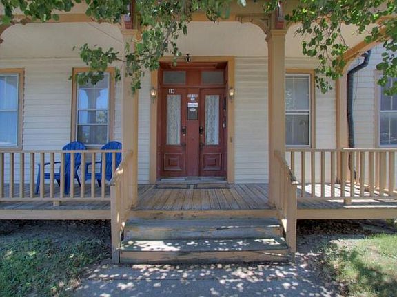 Front of the home (unit is upstairs right)
