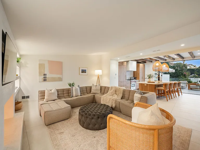 Relax with open views, natural light, and a warm, inviting design.