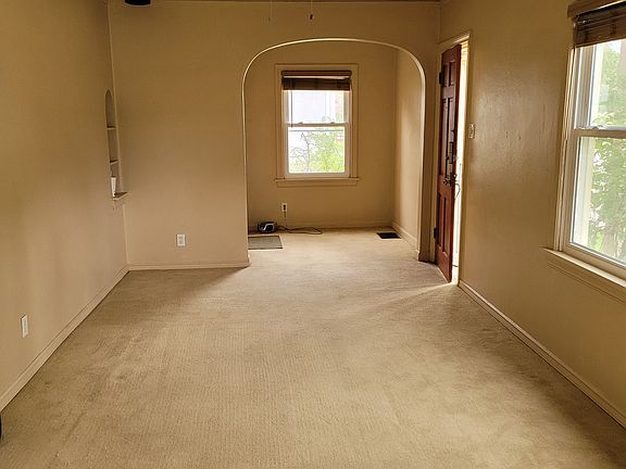 Living room looking east toward entry door