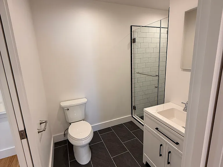 FULLY UPGRADED BATHROOM WITH LARGE STALL SHOWER, LARGE VANITY, MEDICINE CABINET AND KOHLER BRAND PLUMBING FIXTURES