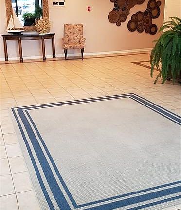 Lovely welcoming lobby in the secured entry of this condo building.  Full-time manager on duty.