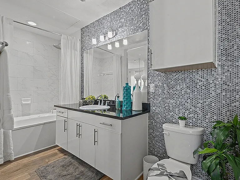 Experience luxury and style in this beautifully designed bathroom space. Experience luxury and style in this beautifully designed bathroom space.
