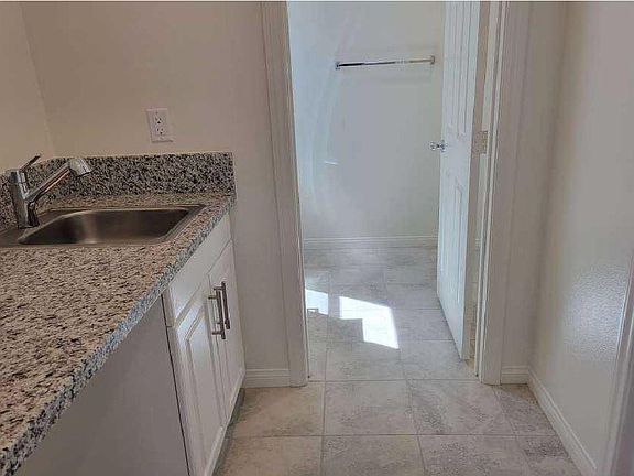 Sink in 1st-floor Bedroom with full shower bathroom