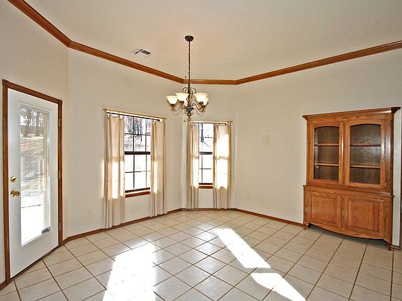 Dining area 15' x 15' (MOL) easily accomodates a large dining table for family
