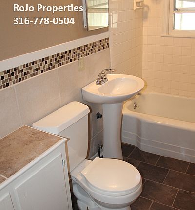 Updated bathroom with shower/tub.