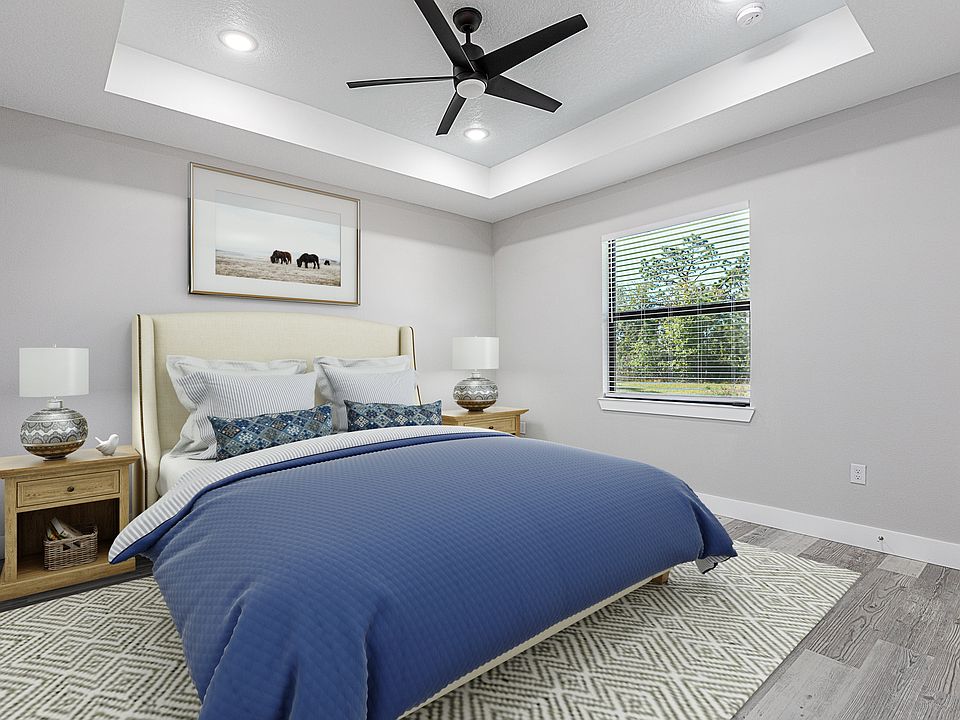 Primary bedroom positioned at the back of the unit. Large enough for a king sized bed, walking closet