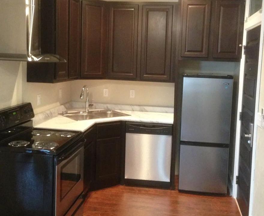 Unit features a full kitchen with stainless steel appliances (microwave too) and a dishwasher. All plates, utensils, pots, coffeemaker, etc. are included.