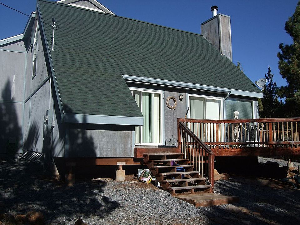 Front of house with front deck