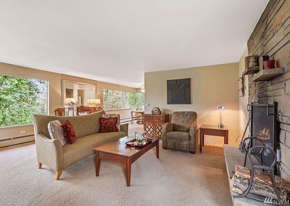 Inside you'll find mid century features that include a spacious floor plan with great flow and natural light.