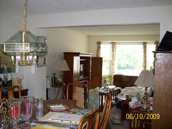 Facing into formal dining room and living room