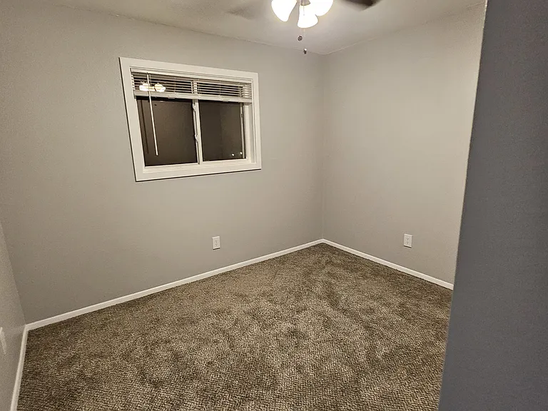 The carpet remains in the smallest bedroom.