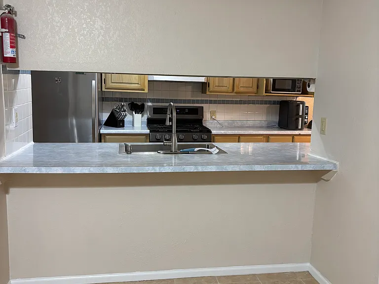 View of kitchen from living room